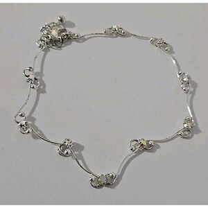 Claire's curved silver bar and clear rhinestone studded anklet